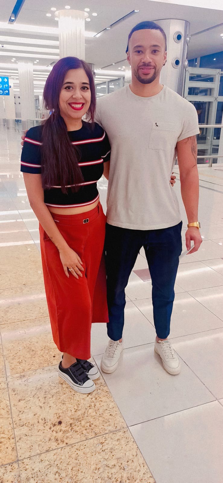 Pooja Sudha with Hollywood actor Archie Madekwe, star of Gran Turismo