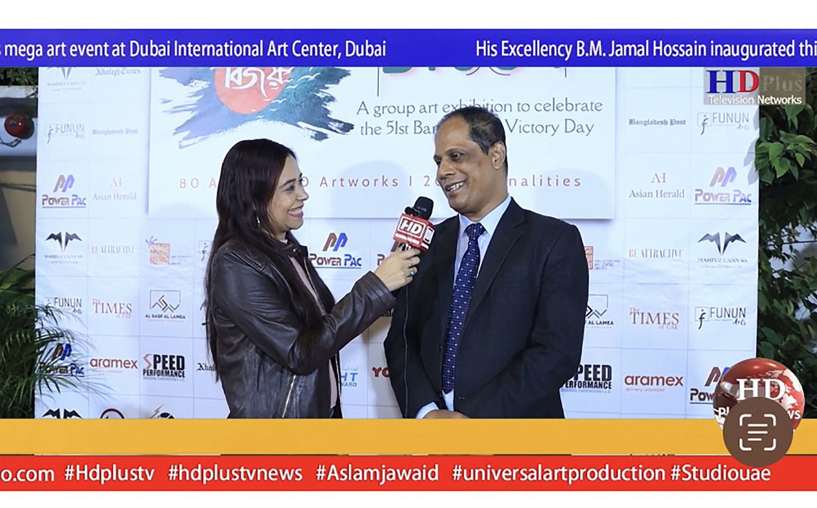 Pooja Sudha interviewing at the Bijoy art exhibition