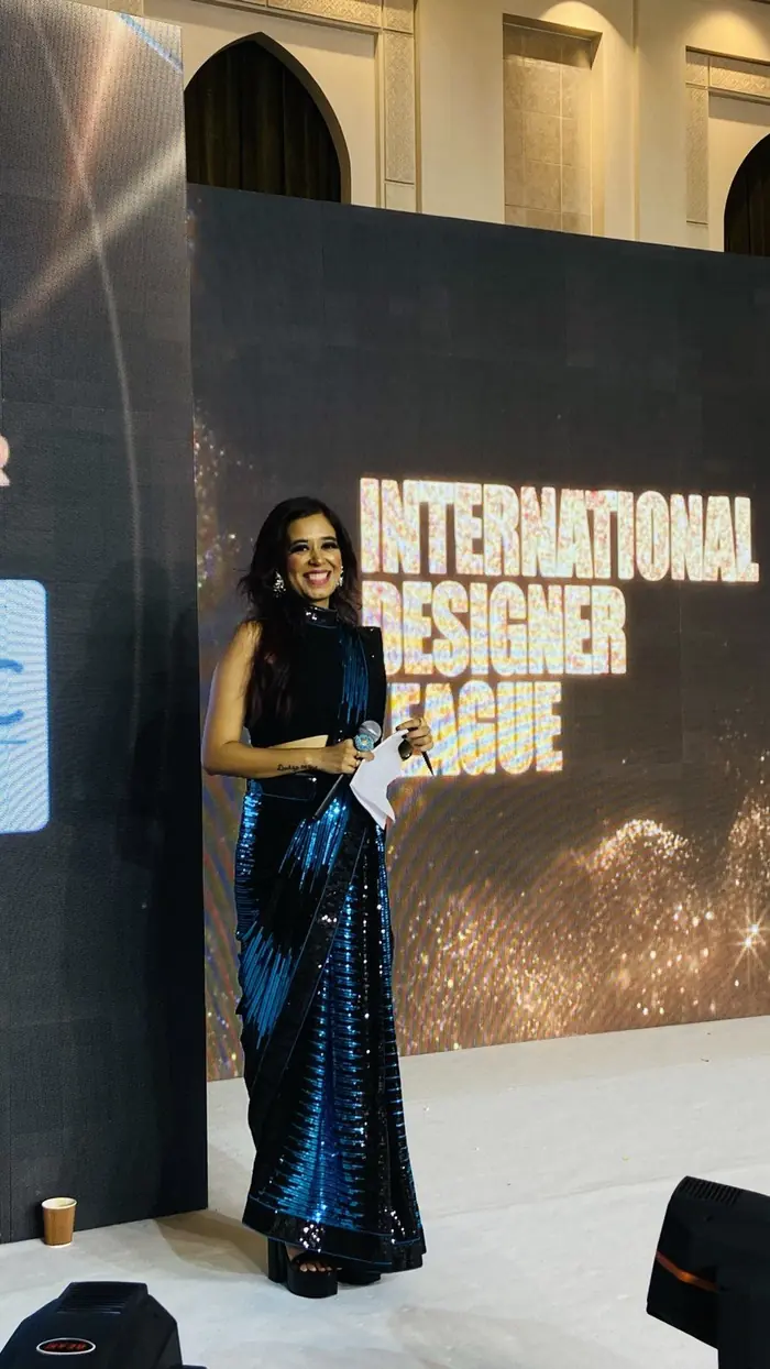 Pooja Sudha on stage at the International Designer League fashion show