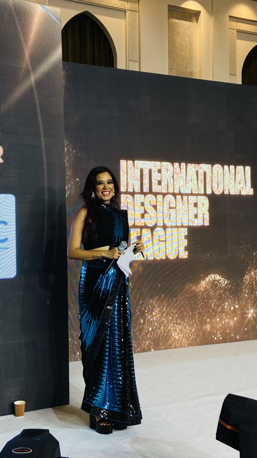 Pooja Sudha on stage at the International Designer League fashion show