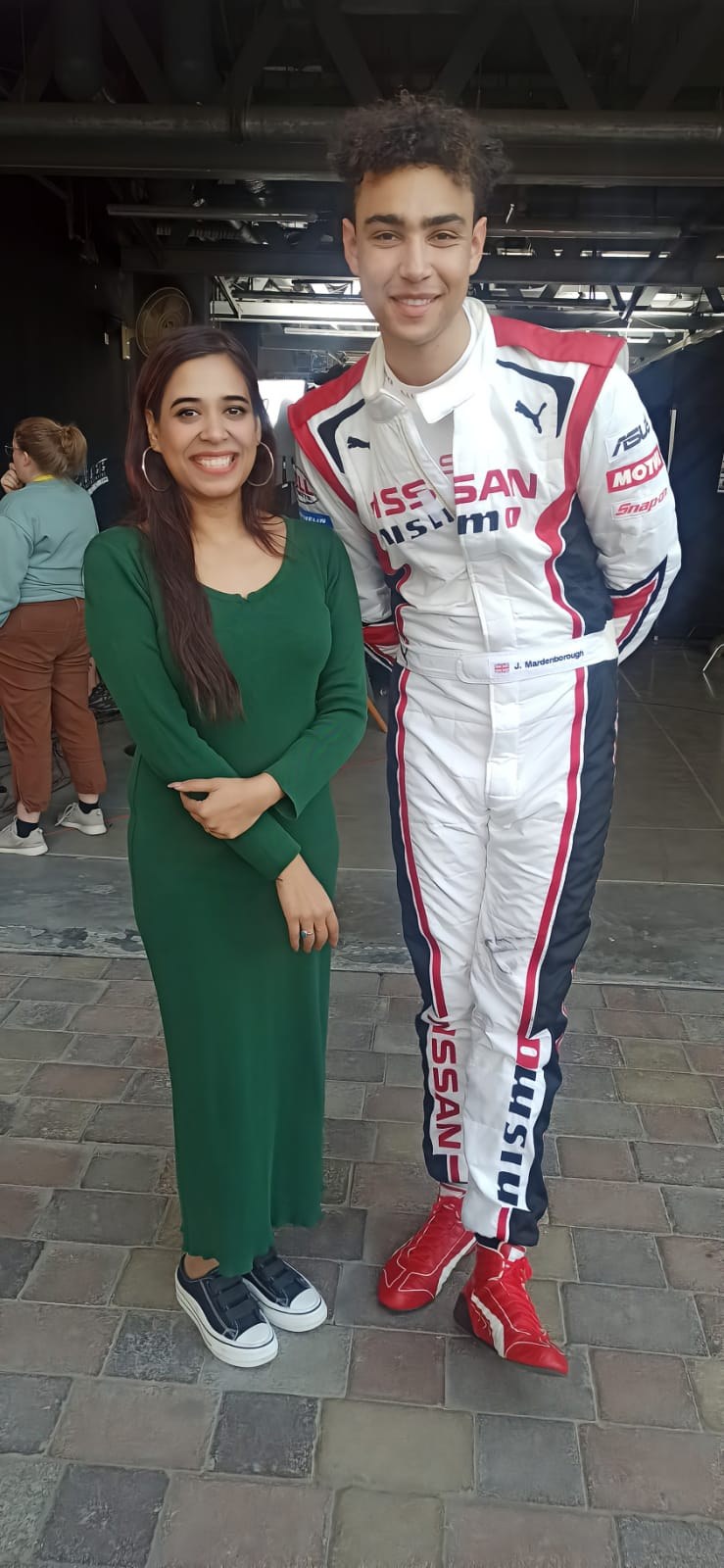 Pooja Sudha with Hollywood actor and racing driver Jann Mardenborough, star of Gran Turismo