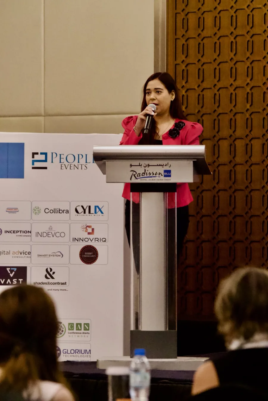 Pooja Sudha, corporate EmCee and conference host, as master of ceremonies at Radisson Blu Hotel Dubai