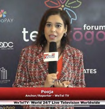 Pooja Sudha interviewing at Techkogo International Summit